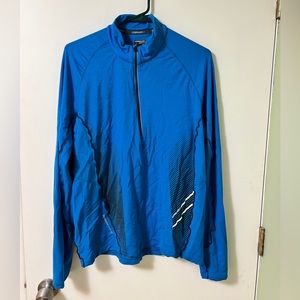 Icebreaker merino base layer.  96% wool 4% elastane. 1/4 zip.